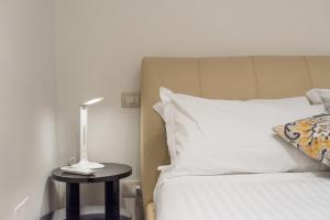 Posteľ alebo postele v izbe v ubytovaní Art Gallery Apartment in Florence