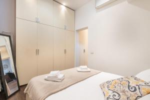 Posteľ alebo postele v izbe v ubytovaní Art Gallery Apartment in Florence