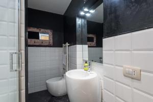 Kúpeľňa v ubytovaní Art Gallery Apartment in Florence