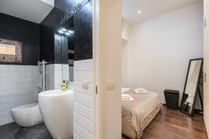 Kúpeľňa v ubytovaní Art Gallery Apartment in Florence