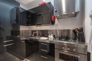 Kuchyňa alebo kuchynka v ubytovaní Art Gallery Apartment in Florence