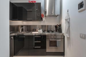 Kuchyňa alebo kuchynka v ubytovaní Art Gallery Apartment in Florence