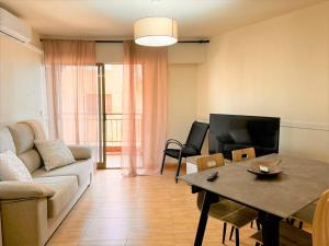A seating area at Marinasunbeach Paseo Maritimo