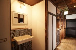 Kuchyň nebo kuchyňský kout v ubytování Nikko Guesthouse Sumica