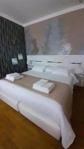 Ένα ή περισσότερα κρεβάτια σε δωμάτιο στο A Flor da Rosa