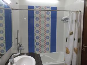 Koupelna v ubytování Mohini Home Stay