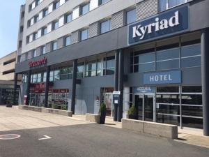 akritkrit hotel is a luxury hotel in a building at Hotel Kyriad Tours St Pierre des Corps Gare in Saint-Pierre-des-Corps