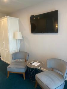 TV a/nebo společenská místnost v ubytování Hotel Residence Promenade