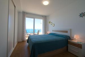 Postel nebo postele na pokoji v ubytování SUNNY DAY APARTMENT CALACEITE