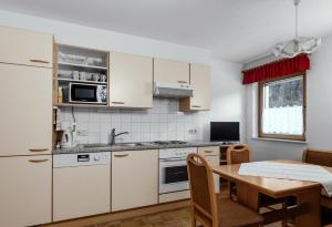 Kuchyň nebo kuchyňský kout v ubytování Apartment Fritz