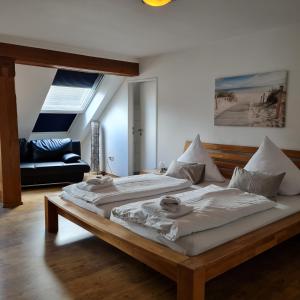 Giường trong phòng chung tại Hotel Restaurant Kastanjehoff