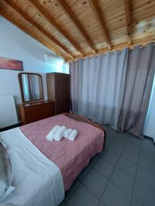 Posteľ alebo postele v izbe v ubytovaní Nota apt 'vacations near the sea'1