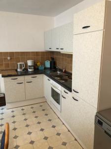 Kuchyň nebo kuchyňský kout v ubytování Moselferienhaus Porten
