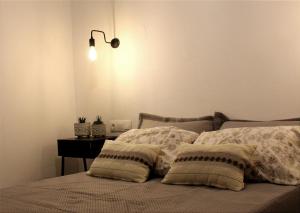 En eller flere senge i et værelse på Το σπίτι της Γιαγιάς - Granny's guest's house