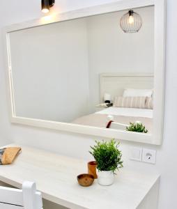 Posteľ alebo postele v izbe v ubytovaní Cozy Flat at Regina Apartments