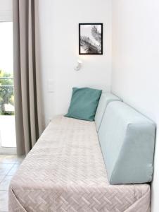 Posteľ alebo postele v izbe v ubytovaní Cozy Flat at Regina Apartments