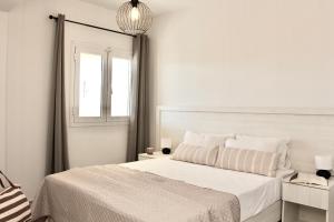 Posteľ alebo postele v izbe v ubytovaní Cozy Flat at Regina Apartments