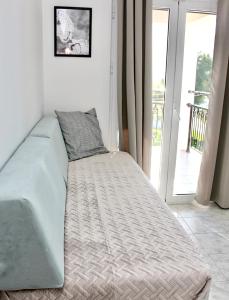 Posteľ alebo postele v izbe v ubytovaní Cozy Flat at Regina Apartments