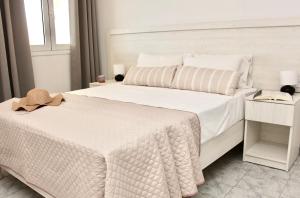 Posteľ alebo postele v izbe v ubytovaní Cozy Flat at Regina Apartments + 21 fotografií