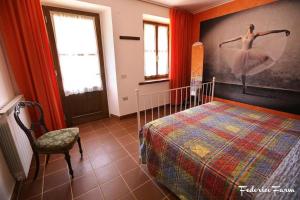 Postel nebo postele na pokoji v ubytování La Casa del Sarto - FedericoFarm