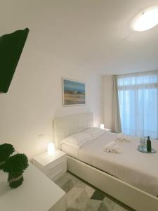 Ένα ή περισσότερα κρεβάτια σε δωμάτιο στο Skyline su San Remo +28 φωτογραφίες