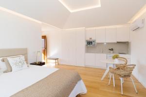 Postel nebo postele na pokoji v ubytování Casa Vieira Lobo + 81 fotografií