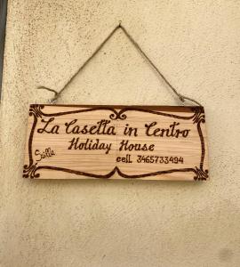 - un panneau indiquant la casita dans la maison de vacances tanta hacienda dans l'établissement La Casetta In Centro - Holiday House, à Scilla