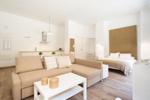 Łóżko lub łóżka w pokoju w obiekcie Santiago Premium loft I