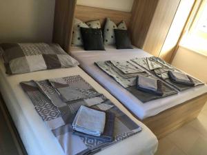 Posteľ alebo postele v izbe v ubytovaní My Paradies - Njivice Studio****