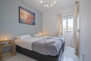 Posteľ alebo postele v izbe v ubytovaní Apartment Marti