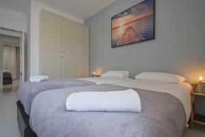 Posteľ alebo postele v izbe v ubytovaní Apartment Marti