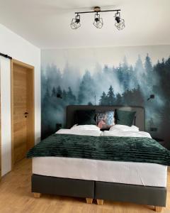 Ένα ή περισσότερα κρεβάτια σε δωμάτιο στο Frankenwald-Lodge