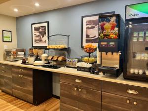 a kitchen with a counter with food on it at Thunderbird Lodge in Redding