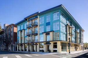 a blue building on a city street with a street at Art House Hotel in Santa Rosa