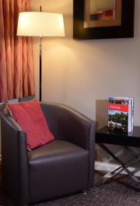 Posezení v ubytování Holiday Inn Telford Ironbridge, an IHG Hotel