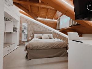 A bed or beds in a room at Interno7 Rooms