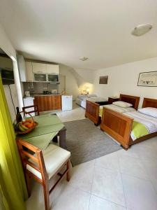 Posteľ alebo postele v izbe v ubytovaní Guesthouse Kresic