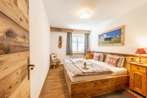 Posteľ alebo postele v izbe v ubytovaní Laurino Apartment