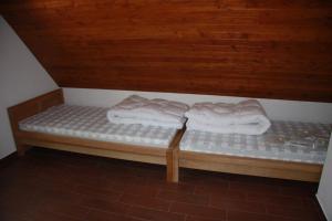 Posteľ alebo postele v izbe v ubytovaní Chata Holiday