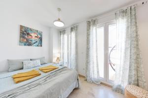 Postel nebo postele na pokoji v ubytování Penthouse Cactus Old Center