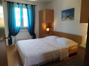 Postel nebo postele na pokoji v ubytování No stress on Cres