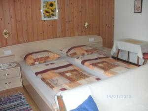 Ένα ή περισσότερα κρεβάτια σε δωμάτιο στο Michael Holaus