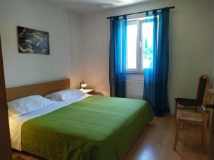 Postel nebo postele na pokoji v ubytování No stress on Cres