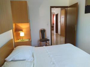Postel nebo postele na pokoji v ubytování No stress on Cres