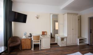 TV a/nebo společenská místnost v ubytování Hotel St. Barbara