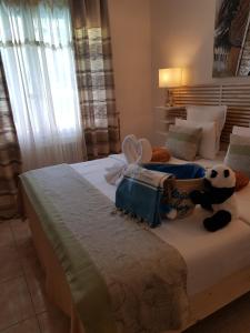 Postel nebo postele na pokoji v ubytování Hotel Villa Maya