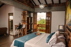 Postel nebo postele na pokoji v ubytování Hotel Santa Laura