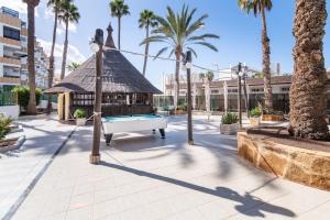 Bazén v ubytovaní Home2Book Sunny Beach Maspalomas Playa del Inglés alebo v jeho blízkosti