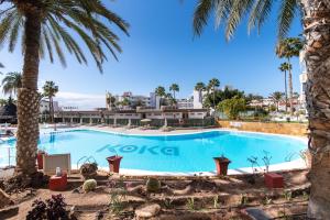 Bazén v ubytovaní Home2Book Sunny Beach Maspalomas Playa del Inglés alebo v jeho blízkosti
