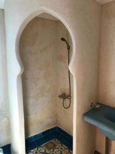 Kylpyhuone majoituspaikassa Torre Hadra